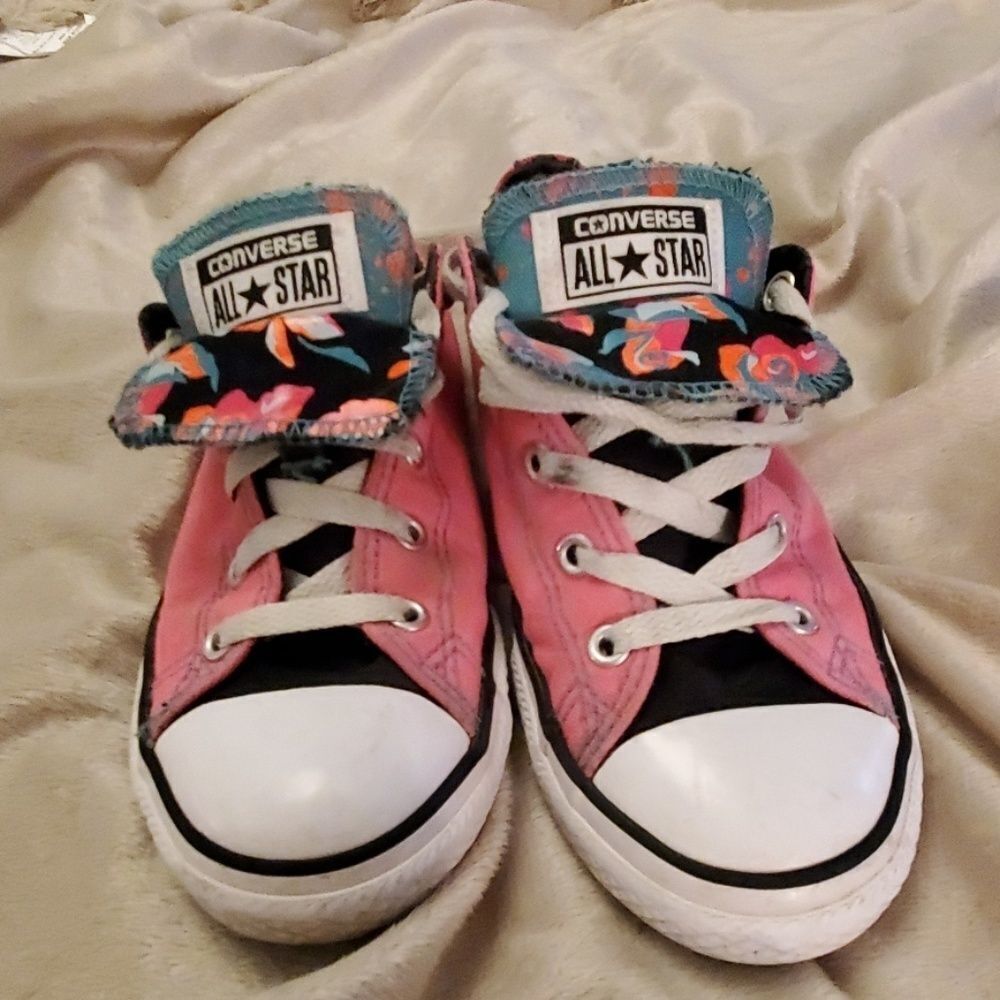 Cute bright pink Converse with floral tongue detail
